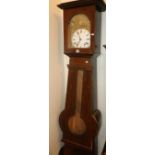 19th century continental faux rosewood longcase clock, the projected moulded cornice over
