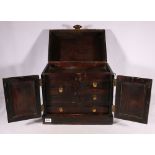 Chinese brass bound wooden chest, two doors opening to reveal drawers, with lift-up lid, 36cm (h)