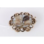 Victorian mourning brooch with four locks of hair arranged as a bouquet with seed pearl band in