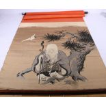 A Kesi scroll panel depicting Fukurukuju standing by a pine tree with a crane, 117 x 52 cm.