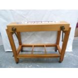 Book Binding Equipment.  Book binder's backing press on wooden tub with swivel wheels, 21cm long.