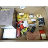 Box of small scale Land Rovers etc.