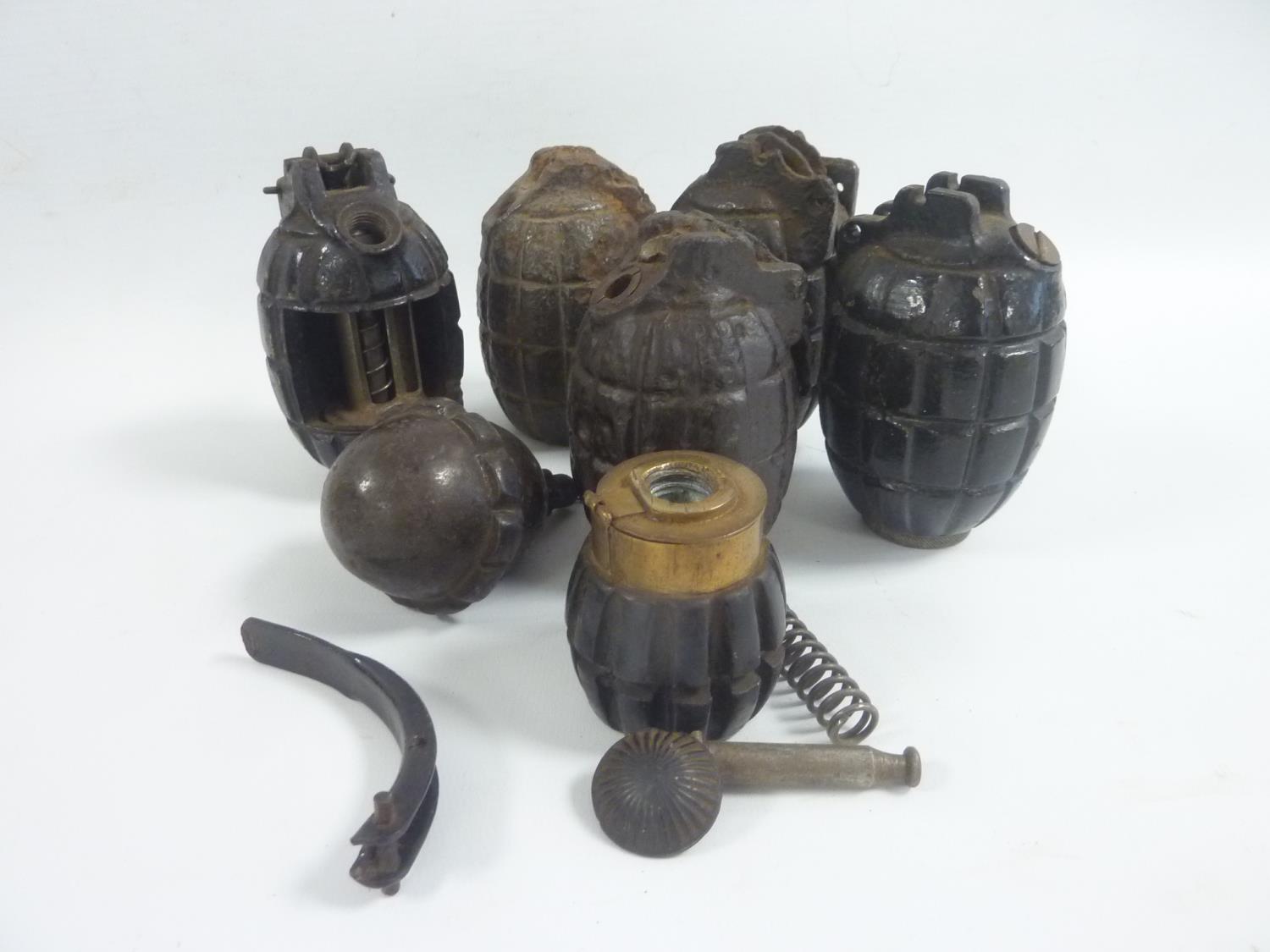 Interesting WW I cut-away training grenade. Also five others, some in excavated condition, including