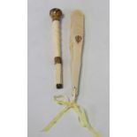 Victorian or Edwardian ivory parasol handle, carved to simulate bamboo with gilt metal scroll