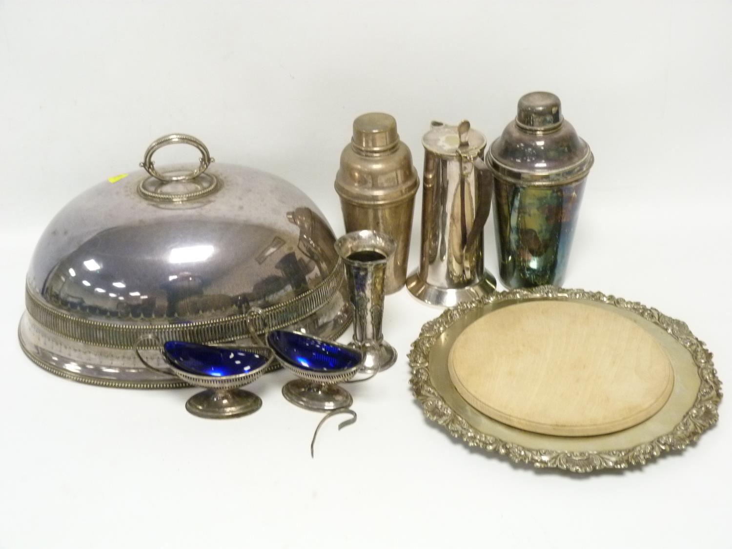 E.p. meat dish cover, two cocktail shakers, a hot water pot and various other items.