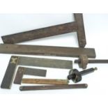 Two brass & wood set squares, T square, folding rule, spirit level with the name William Hodgson