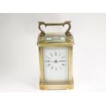 Carriage clock timepiece with platform lever in corniche case.