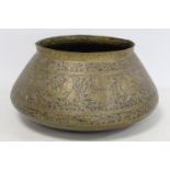 Large antique Persian brass pot of squat circular form with repousse decoration of figures, birds