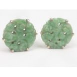 Pair of carved jade button ear studs, 13mm in 9ct white gold.