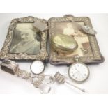 Two silver mounted photograph frames, a Waltham nickel watch another Geneva lever in silver and