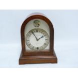 Mantel clock timepiece by Winterhalder & Hofmeier for Hamilton & Inches, the arched silvered dial