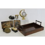 Small Victorian rosewood tray with turned wooden handles, 26cm long; a boudoir timepiece, the