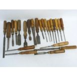 Aprox 23 antique and vintage wood and wood turning chisels.