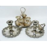 Pair of Sheffield plated chamber candlesticks and an egg frame with four cups.