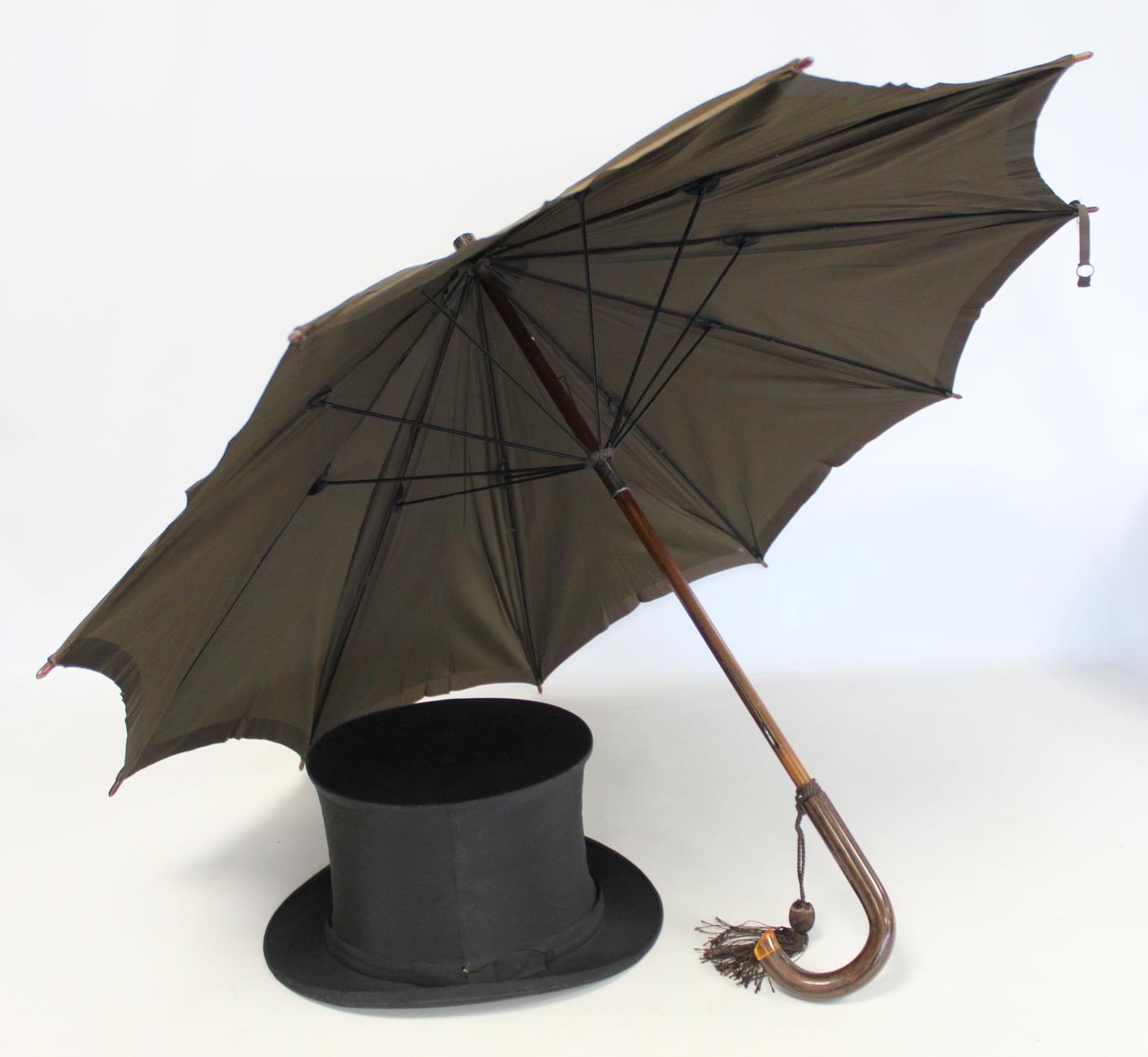 Early 20th century vintage "Peerless" lady's umbrella with simulated rosewood and amber handle and