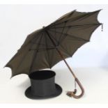 Early 20th century vintage "Peerless" lady's umbrella with simulated rosewood and amber handle and