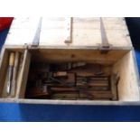 Carpenters wood tool chest with small inner shelf containing box planes, shouldering and moulding
