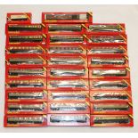 Twenty-seven Hornby Railways OO gauge model railway rolling stock including three R429 GWR composite