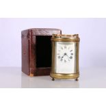 19th century French carriage clock of cylindrical form with enamel dial having Roman numeral chapter