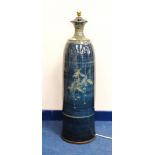 Studio pottery floor lamp by Louis Mulcahy, blue glaze with floral design, 82cm high.
