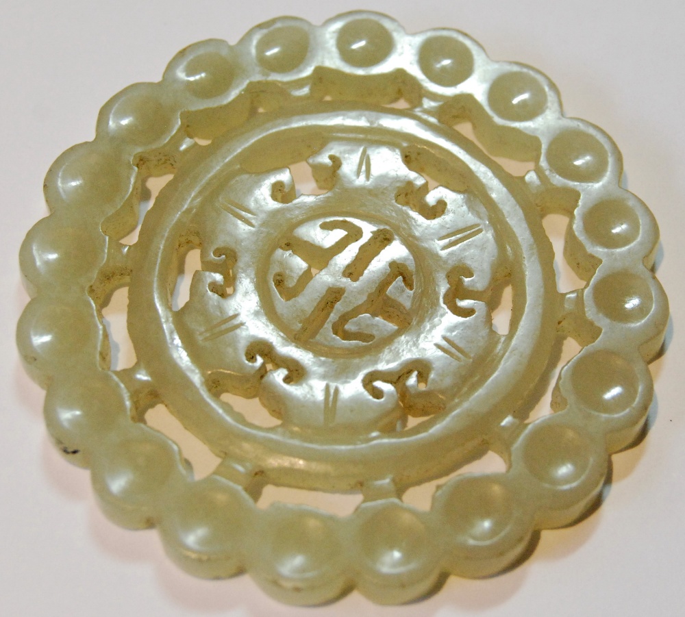 Chinese jade pendant of pierced circular form, 55mm, an onyx oval brooch, an opal spray brooch and - Image 3 of 3