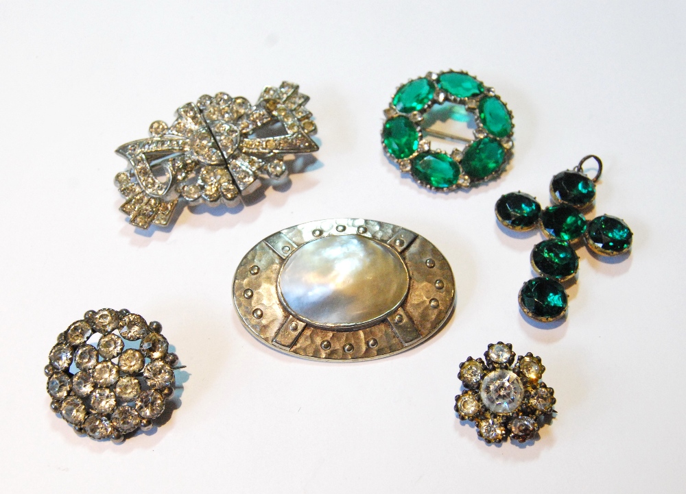 Plantagenet nickel and bluster pearl oval brooch and five old paste brooches, leather case.