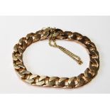 9ct gold identity bracelet of filed curb pattern, 38g.