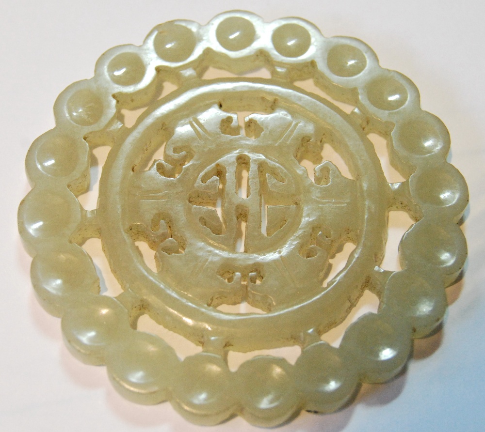 Chinese jade pendant of pierced circular form, 55mm, an onyx oval brooch, an opal spray brooch and - Image 2 of 3