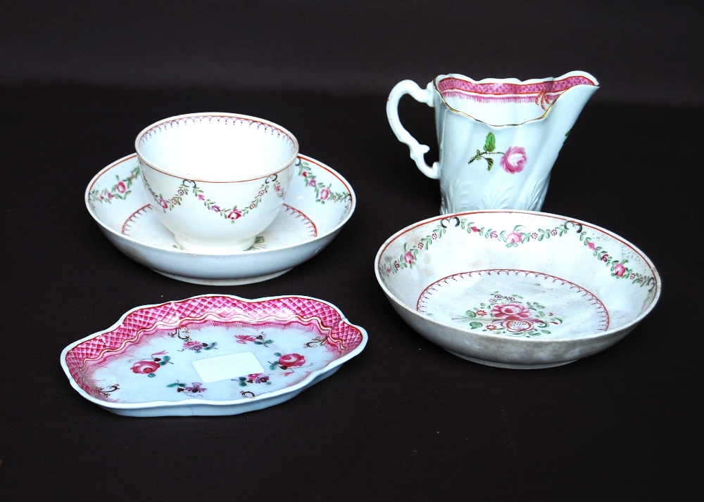 Late 18th century English porcelain tea bowl with two saucers, polychrome rose sprays & swags,