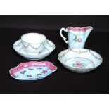 Late 18th century English porcelain tea bowl with two saucers, polychrome rose sprays & swags,