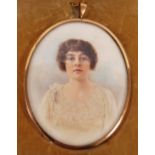 Cased portrait miniature of a young lady, 9cm x 7cm.