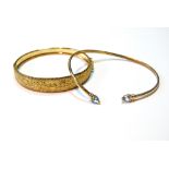 9ct gold hinged bangle and another, with spinels, 14g.