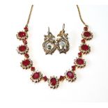 Silver gilt necklace with graduated ruby and white sapphire clusters, also a pair of similar drop