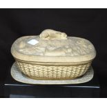 19th century ivory coloured earthenware game tureen on stand, of naturalistic basket form, the cover