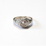 Diamond solitaire ring with brilliant, approximately .6ct, in octagonal setting with pierced and