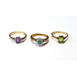 Diamond and emerald daisy cluster ring, another, amethyst, and another, peridot, sizes M/N.   (3)