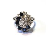 Dress ring with six oval and round sapphires and brilliant diamonds in scrolls, 18ct white gold,