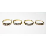 Three diamond rings, each now with four stones, 18ct gold, and another, channel-set, 9ct.   (4)