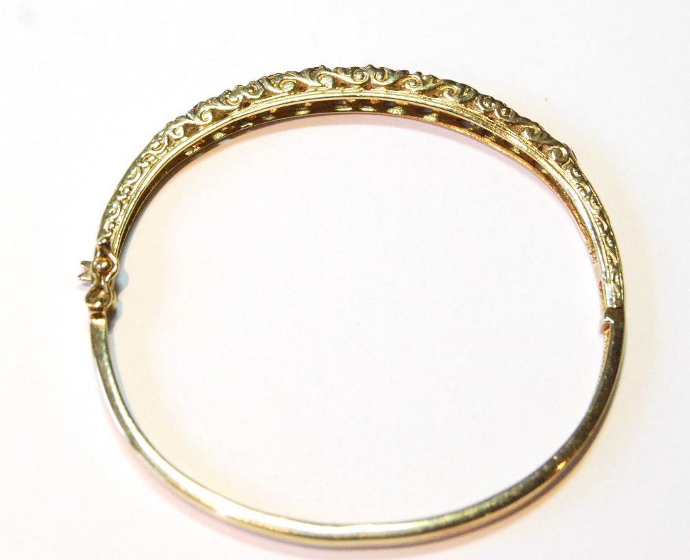 9ct gold hinged bangle with diamonds and rubies, 11.9g. - Image 2 of 3