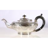 William IV silver tea pot of squat form having chased C scroll and foliate spray incised and