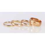 Four 9ct gold wedding bands, 9.2g gross