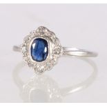 18ct platinum diamond and a sapphire ring, size P, 2.2g