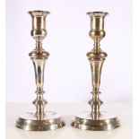 Pair of Art Deco silver candlesticks by Edward Barnard and Sons Ltd London 1920, 22cm tall