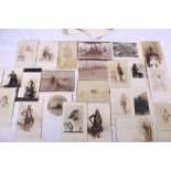 A group of around 40 late Victorian and Edwardian real photographic postcards of African interest,