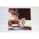 Photograph of an astronaut standing on the moon printed on Kodak paper, 31cm x 30cm