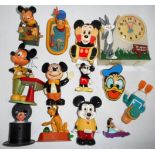 Small collection of old Mickey mouse and other plastic figures.