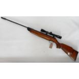 Weihrauch HW 80 .22 air rifle. Fitted with 4 x 32 scope. Strong spring. Front sights missing.