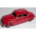 Dinky. 140b Rover 75 saloon. 1951-4. Maroon/maroon. Two flat tyres otherwise Good Average condition.
