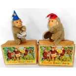 Two German made Jolly Musical Monkeys. Both in defective boxes.