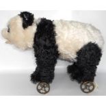 Steiff Bear. 400452 Panda on wheels. 1938 replica.